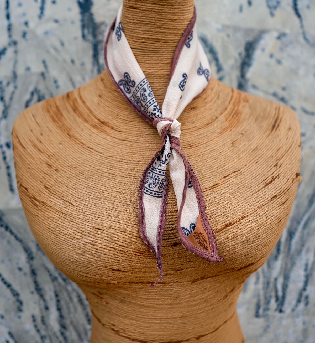 Wisteria Paisley Neck Scarf, a lightweight scarf with a blue and white paisley design