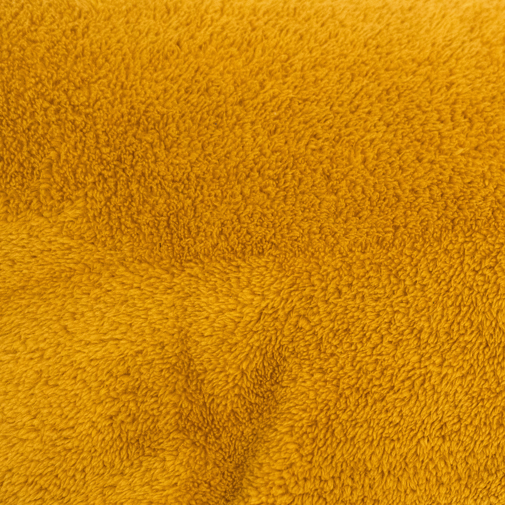 closeup of fabric, fuzzy and golden yellow